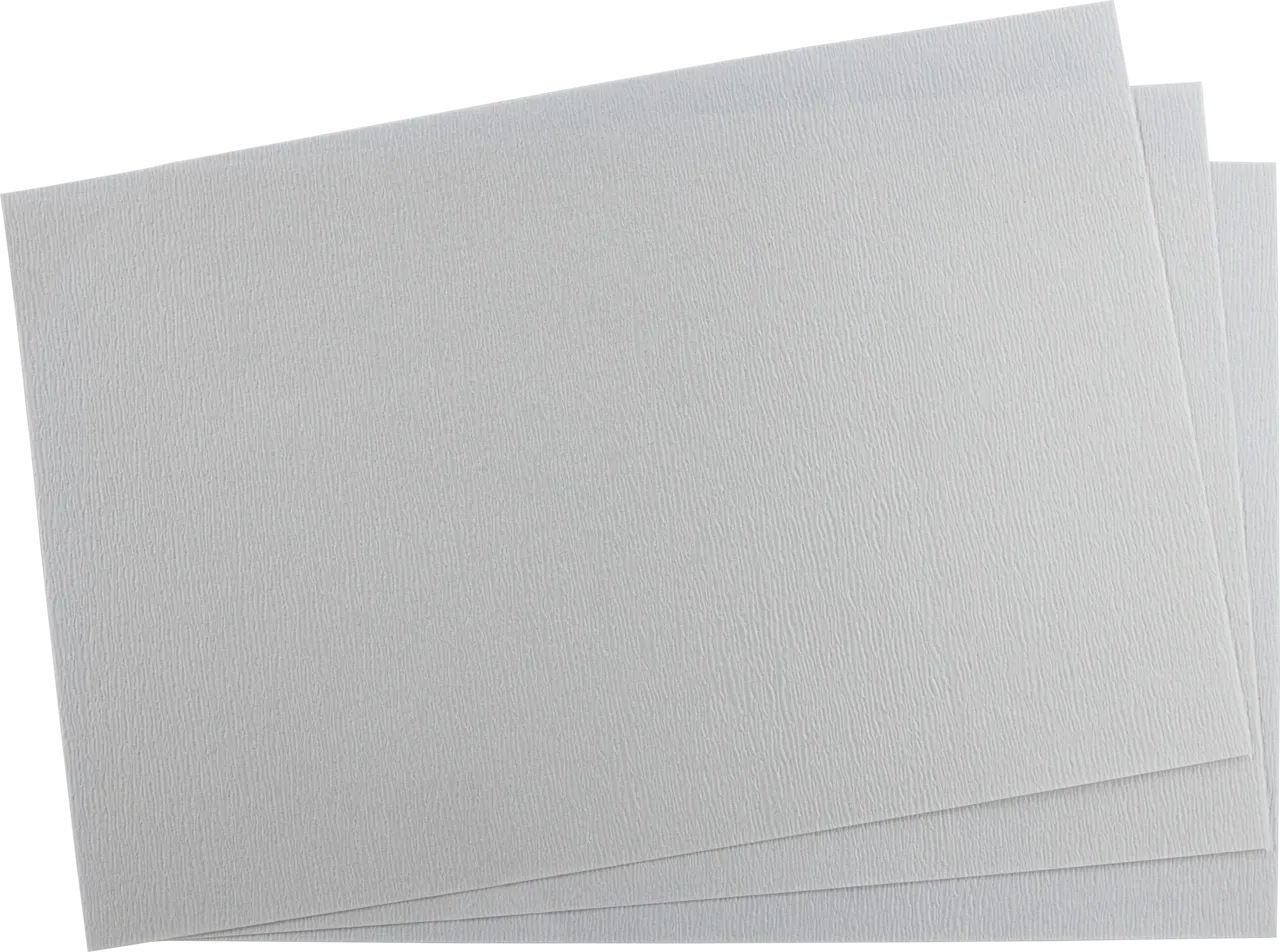 Ansicht mehrerer gestapelter, weißer Macherey-Nagel Filterpapierbögen MN 652 (technisch, schnell (17 s), gekreppt) in rechteckiger Form vor transparentem Hintergrund.